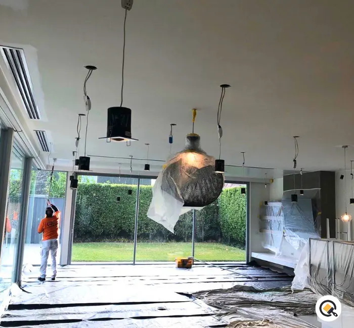 Quest Paintings Painters painting a house in Brighton